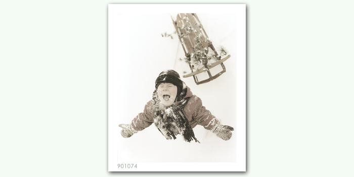 photograph of girl and sled