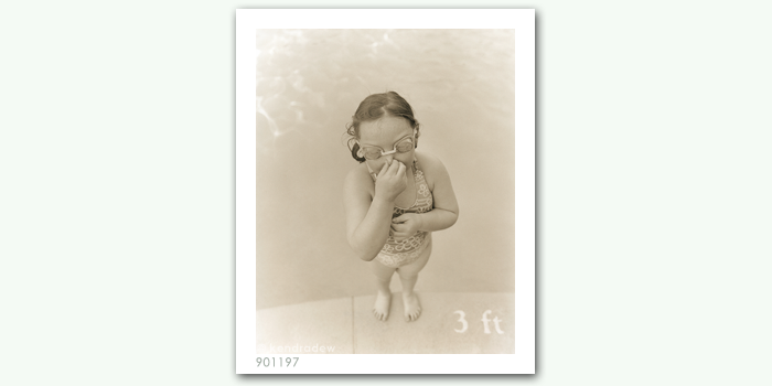 photograph of girl by swimming pool