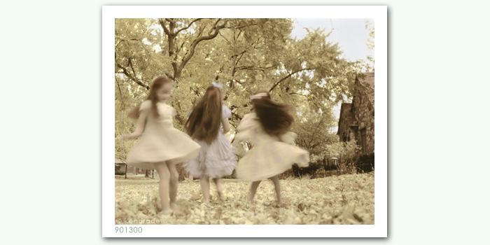 photograph of girls spinning