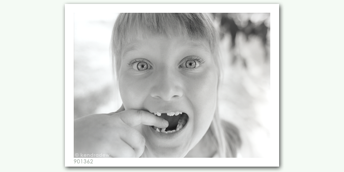 photograph of girl missing teeth