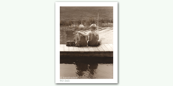 photograph of boys on dock