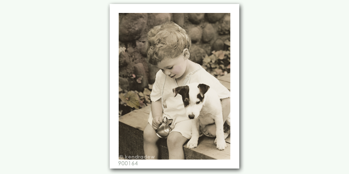 photograph of boy and dog