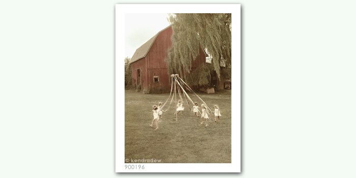 photograph of girls around a maypole