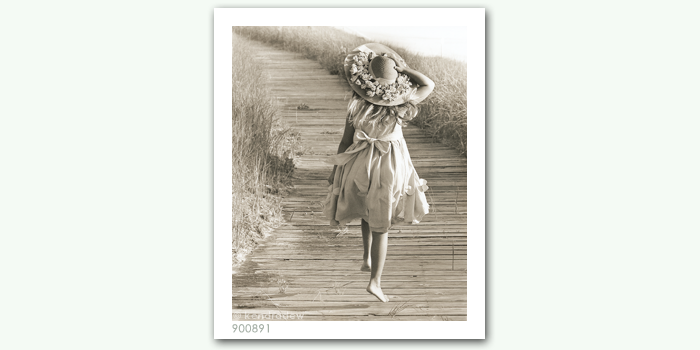 photograph of girl on boardwalk