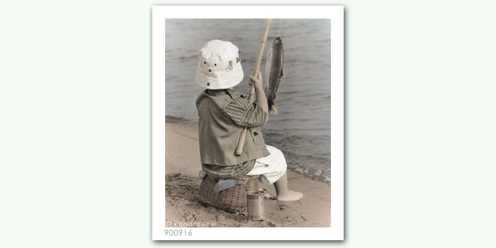 photograph of boy fishing