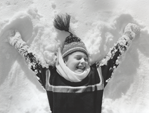 photograph of boy in snow