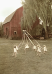 photograph of girls around a maypole