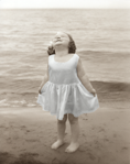photograph of girl on beach