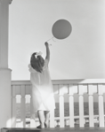photograph of girl with balloon